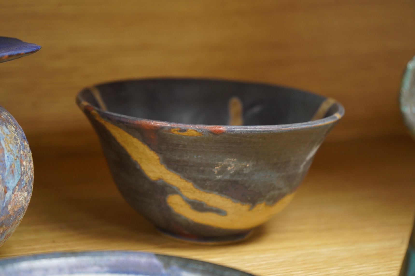 A collection of studio pottery to include crystalline glazed works by Stephen R Jones Des, Brighton, vases and a pair of dishes, largest 22cm high